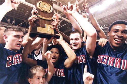 Men's Basketball team celebrating championship 2000